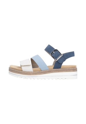 Women's sandal with white, light blue, and navy straps, ankle buckle, cushioned sole, and white ridged platform sole with woven detail.