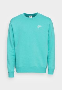 Turkos Nike sweatshirt med rund halsringning, långa ärmar och ribbade manschetter. Har den vita Nike-logotypen på bröstet. Mjuk textur.