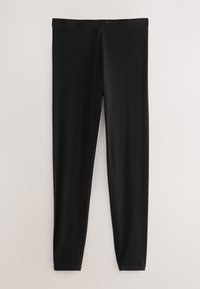 Leggings neri slim fit alla caviglia, mostrati distesi su uno sfondo bianco, con una fascia semplice in vita e tessuto dalla trama liscia.