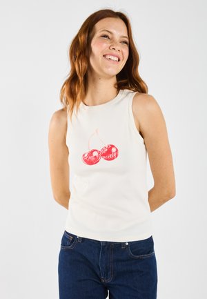 White ribbed tank top featuring a red cherry graphic and text "You're Sweet!" in a playful font. Soft texture and fitted design.