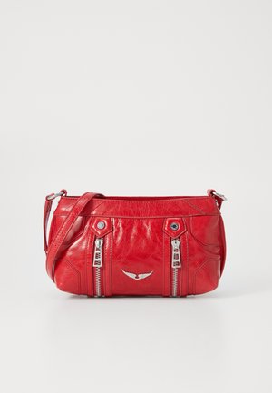 Red leather handbag with zippered compartments, silver hardware accents, and a subtle wing emblem on the front. Compact design with shoulder strap.