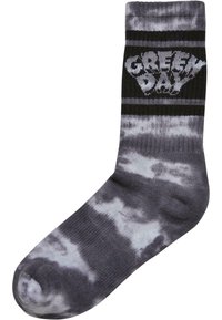 Grå tie-dye ankelstrømpe med en solid sort ring, der pryder det hvide "Green Day" logo, ribbet struktur og afrundet tå.