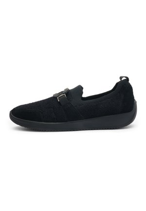 Black slip-on shoe with textured fabric upper, rubber sole, and front strap with buckle detail, shown in side profile.