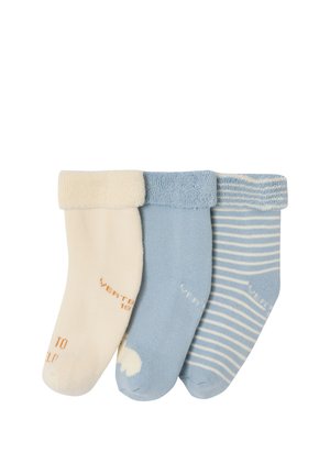 Three folded baby socks in cream, solid light blue, and light blue with white stripes arranged side by side.