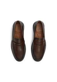 Brown leather loafers with a smooth finish, decorative stitching and a cushioned insole. Features a rounded toe and flexible rubber sole.