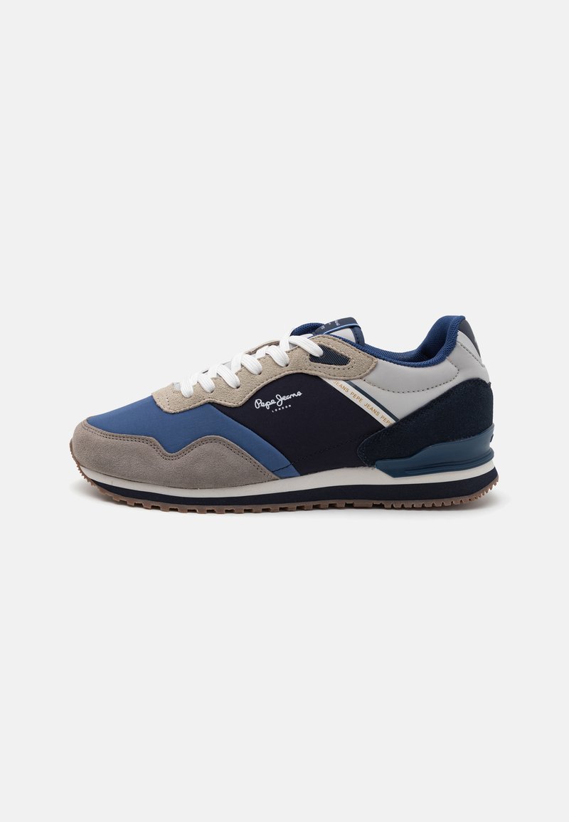 Men's sneakers featuring a mix of blue, gray, and navy materials, suede and fabric upper, white laces, and a textured rubber sole.