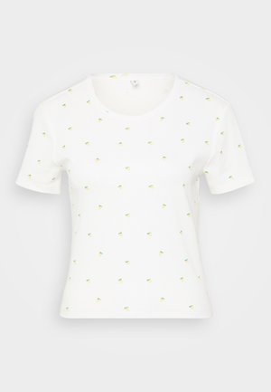 Hvit t-skjorte med korte ermer med små, fargerike ananastrykk. Har rund halshull og mykt, teksturert stoff.