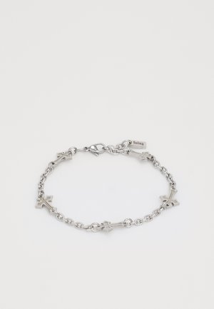 Silver chain bracelet with five small crosses evenly spaced and a lobster clasp closure on a plain white background.