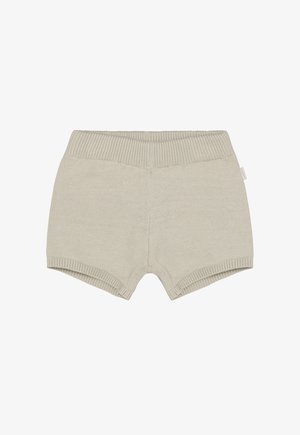 Strikkede shorts i lys beige, med bred ribkant, blød tekstur og sømløst design. Velegnet til afslappet påklædning.