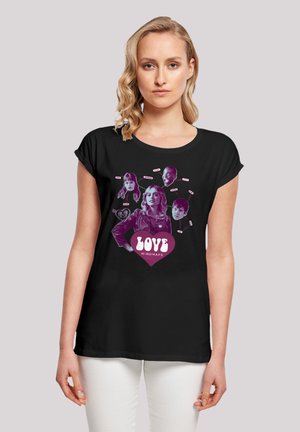 Schwarzes T-Shirt mit kurzen Ärmeln, das ein pinkes Grafikdesign mit dem Text "LOVE MINDMAPS" und Illustrationen von Gesichtern in einem Herzlayout zeigt.
