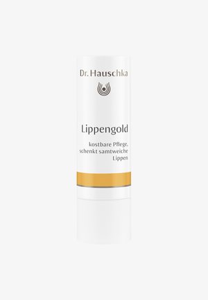 White cylindrical lip balm tube with gold accents and a gray band, labeled "Lippengold" and branded with "Dr. Hauschka" logo.