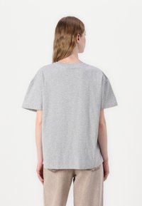 Gray, short-sleeve t-shirt with a relaxed fit, round neckline, and a simple design. Smooth texture, minimal detailing, view from the back.