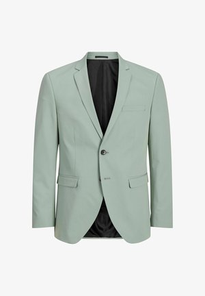 Lysegrøn skræddersyet blazer med to forlommer med klap, en brystlomme, to knapper og sort inderfor, vist forfra.