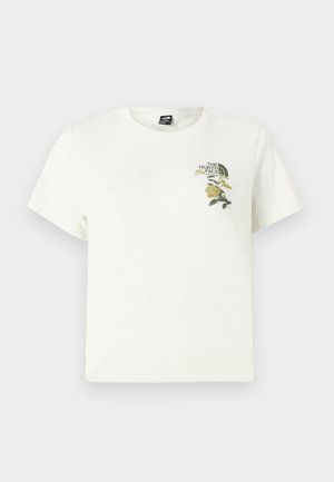 Λευκό βαμβακερό T-shirt με κοντά μανίκια. Διαθέτει πράσινη και κίτρινη κεντητική με λουλούδια στο αριστερό στήθος, με το λογότυπο. Κανονική εφαρμογή.