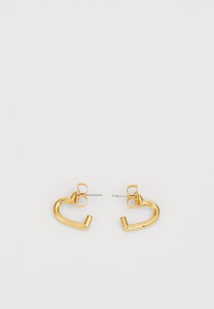 Small gold-tone open heart-shaped hoop earrings with silver stud posts on a white background.