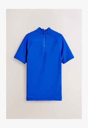 Kék rövid ujjú napvédő póló magas gallérral, hátul cipzárral, sima, rugalmas anyagból készült.