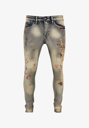 Skinny Jeans aus ausgebleichtem blauen Denim mit distressed Finish. Merkmale sind mehrfarbige Farbspritzerakzente vorne, Fünf-Taschen-Design und Gürtelschlaufen.
