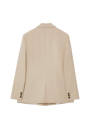 Blazer beige à coupe simple, revers crantés et trois boutons marron sur chaque poignet. Texture lisse, détail fente au dos.