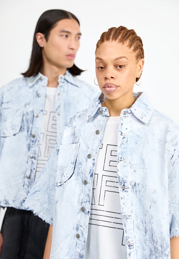 SURVIVOR UNISEX - Shirt2