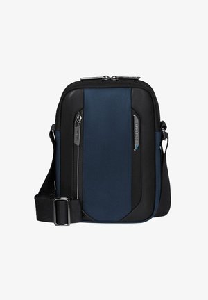 Borsa a tracolla compatta in blu navy e nero, con tracolla regolabile, tasche frontali con zip e zip in metallo argentato.