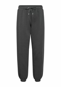 Mörkgrå sweatpants tillverkade av mjukt material, med ett elastiskt midjeband och justerbar snörning samt smalnande anklar.