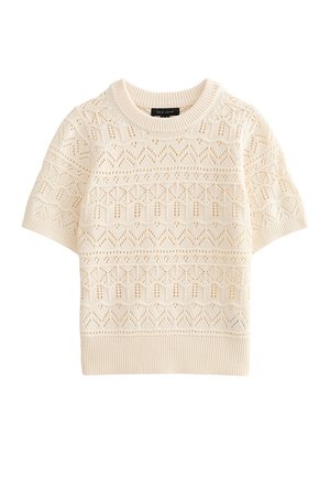 Roomkleurige gebreide trui met korte mouwen, ronde hals en patroon van opengewerkt motief door de hele stof.