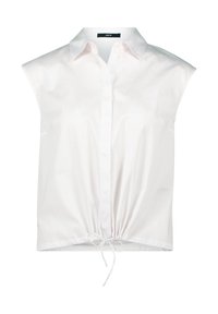 Blouse blanche à manches courtes avec col, fermeture boutonnée sur le devant et ourlet à cordon de serrage. En tissu lisse, elle présente une coupe décontractée.