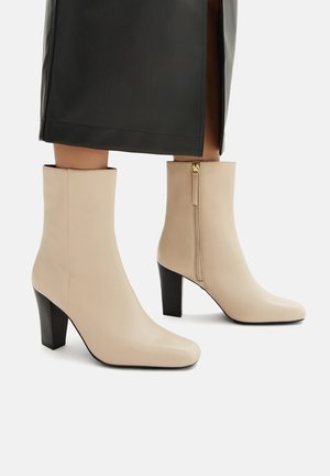 Gležnjače s visokom petom - beige