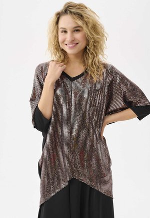 Shiny, sequined tunic with a V-neckline, short sleeves, and an asymmetrical hem in dark colors. Features a soft, textured surface.