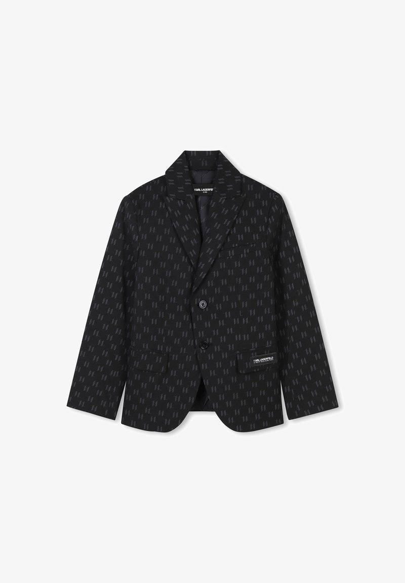 Veste noire avec un motif géométrique discret, fermeture à un bouton, revers crantés, deux poches avant et logo de la marque sur la poche inférieure.