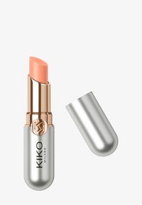 KIKO Milano läppbalsam i en silver metallisk förpackning med en guldaccent. Balsamet har en mjuk persikofärg med en slät, rund topp.