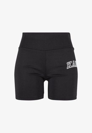 Melnas sporta bikses ar augsto jostu, izgatavotas no elastīga auduma, ar baltu logotipu kreisajā pusē un gludu virsmu.