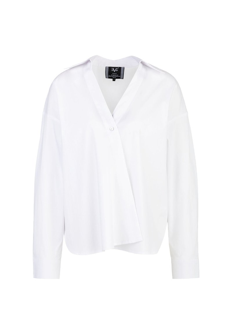 White long-sleeve shirt with a V-neck and button closure. Features a loose fit and slightly asymmetrical design. Smooth, lightweight fabric.