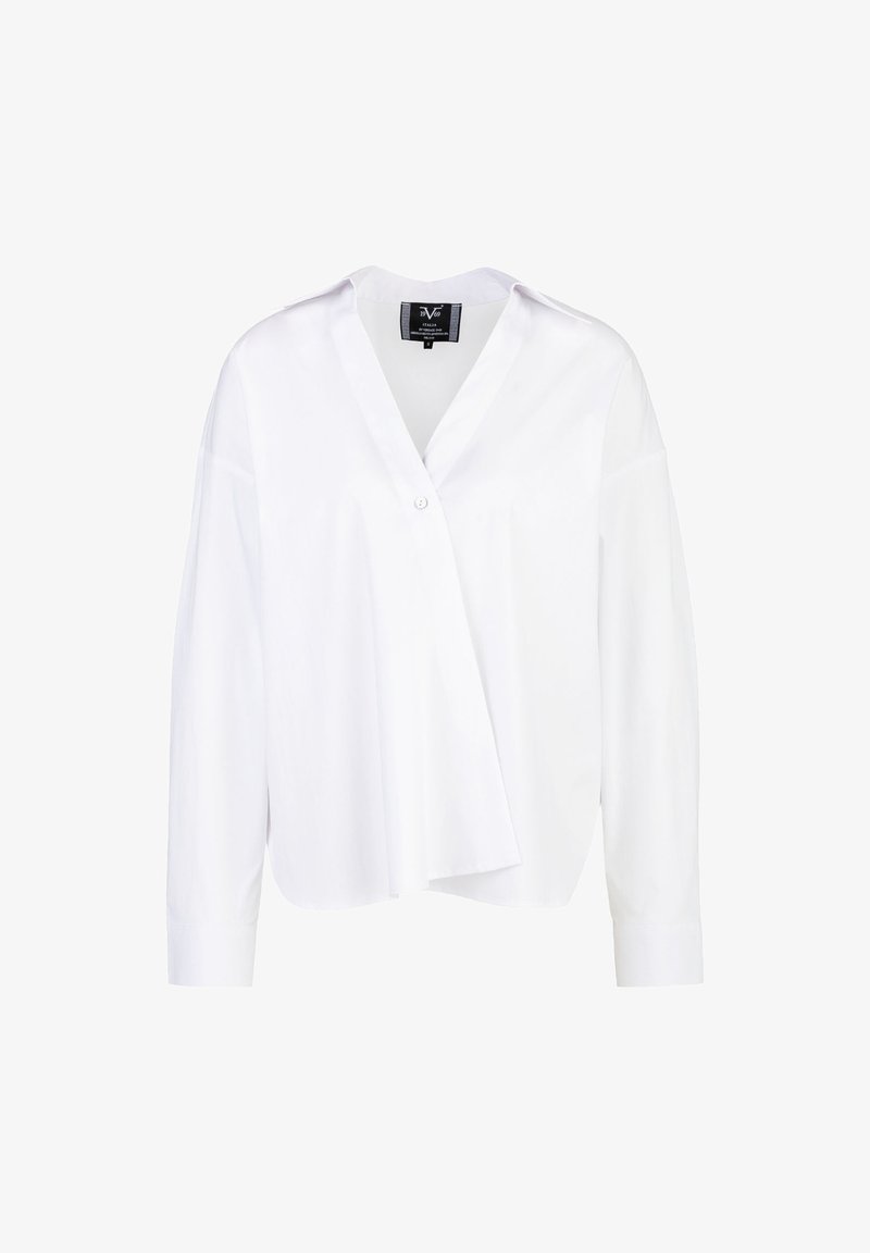 White long-sleeve shirt with a V-neck and button closure. Features a loose fit and slightly asymmetrical design. Smooth, lightweight fabric.