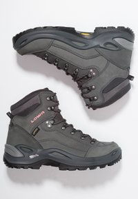 Graue Wanderschuhe mit wasserdichtem Obermaterial, ausgestattet mit einem Mesh-Kragen, Metallösen, einer robusten Laufsohle und einem leuchtenden Logo.