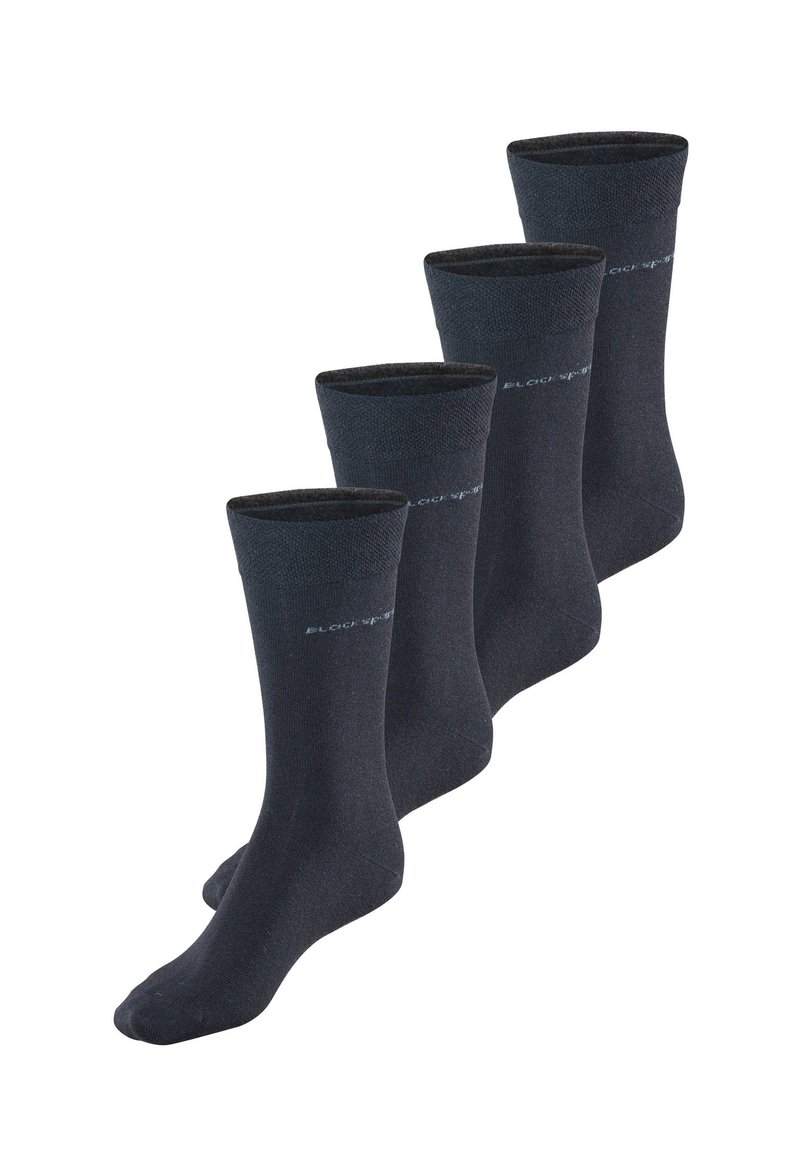 Calcetines de color gris oscuro, hechos de tejido de punto, con una parte superior acanalada, una textura suave y un discreto detalle de logo en el lateral. Paquete de cuatro.
