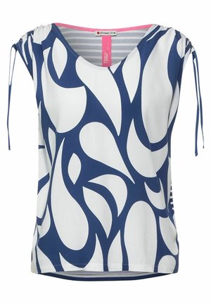 Biała i granatowa koszula z krótkim rękawem z abstrakcyjnym zakrzywionym wzorem, różowym obszyciem wewnętrznego wykroju i regulowanymi ściągaczami na rękawach.