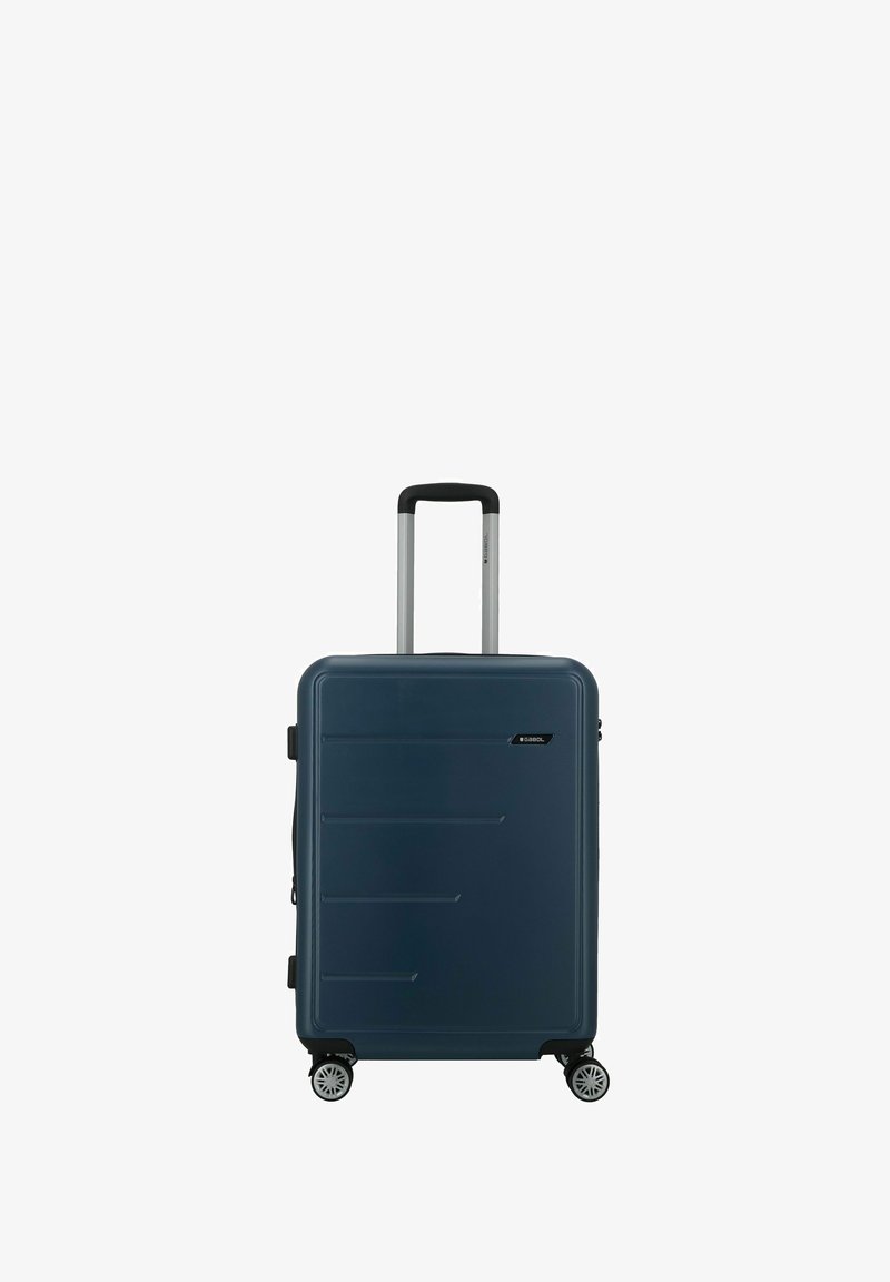 Valigia rigida di colore blu scuro con manico telescopico e quattro ruote girevoli, in posizione verticale su uno sfondo bianco.