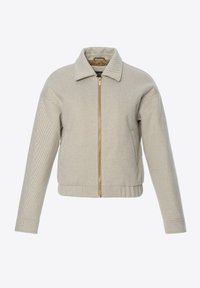 Giacca corta beige con motivo strutturato, chiusura frontale con zip, colletto appuntito e tasche laterali. Caratterizzata da polsini e orlo a coste. Dettaglio zip dorata.