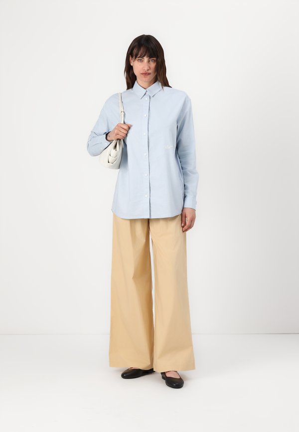 PANTALONI - Trousers - vibrant beige2