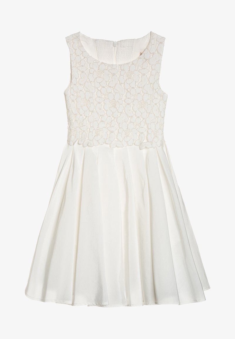 Robe blanche sans manches avec corsage en dentelle florale et jupe plissée fluide, conçue pour les occasions formelles ou spéciales.