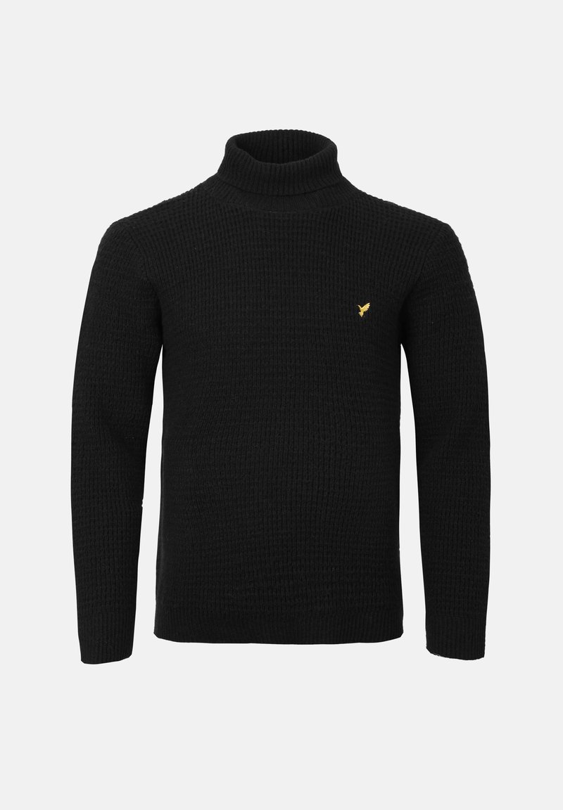 Maglione a collo alto nero lavorato a maglia con maniche lunghe. Presenta una texture a coste e un piccolo emblema dorato sul petto. Design semplice, senza motivi.