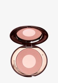 Round compact with a dark brown case. Contains a light pink circle and a peachy blush. Smooth texture with a shiny finish and gold accents.