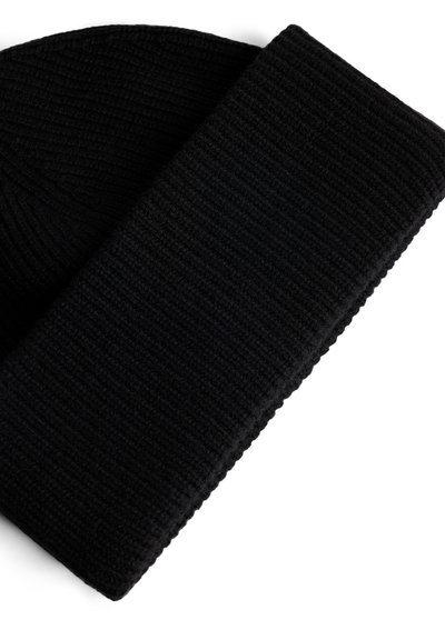 Black knit beanie with a ribbed texture and folded cuff. The fabric appears soft and warm, suitable for cold weather.