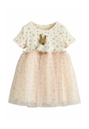Vestido color crema con mangas cortas, estampado floral y falda de tul con un detalle de peluche de conejo en el pecho. Tejido suave y texturizado.