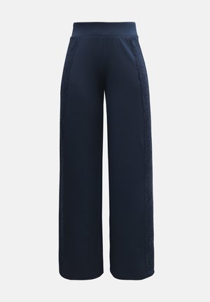 Pantaloni a gamba larga blu navy realizzati in un tessuto morbido, con una vita spessa e dettagli in pizzo testurizzato lungo i lati.