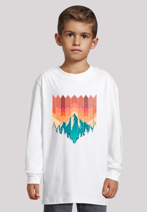 White long-sleeve shirt featuring a graphic design of mountains and trees in turquoise, orange, and peach colors, with a chevron pattern.