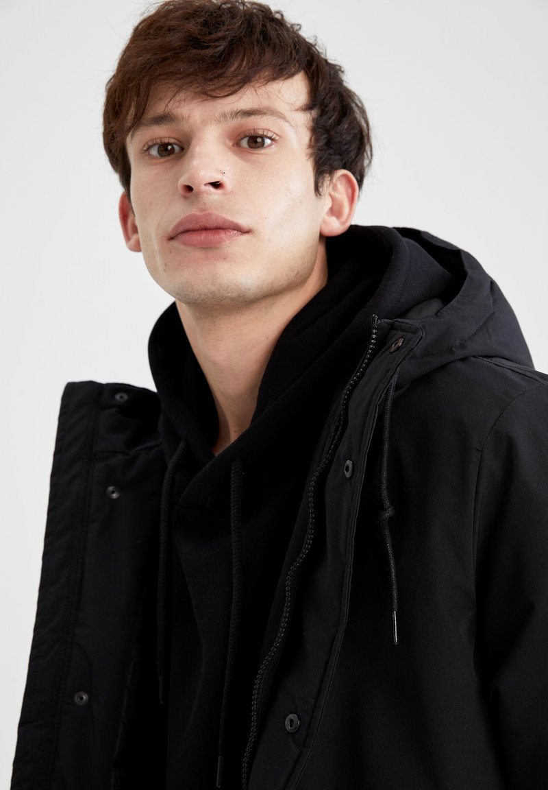 Herren Trenchcoats | DeFacto REGULAR FIT Parka black/schwarz - NI43539 Herren Trenchcoats | DeFacto REGULAR FIT Parka black/schwarz - NI43539