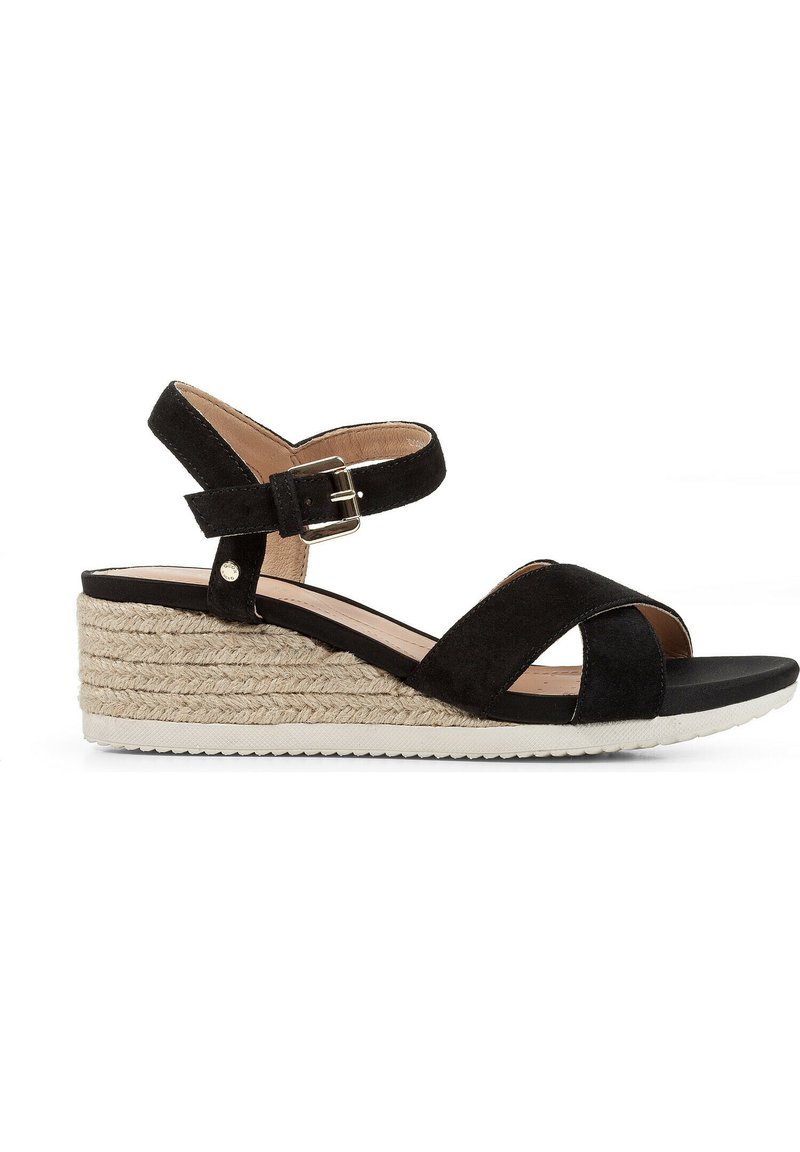 Sandali con zeppa in suede nero caratterizzati da un design incrociato, cinturino alla caviglia regolabile con fibbia e base piattaforma avvolta in juta.