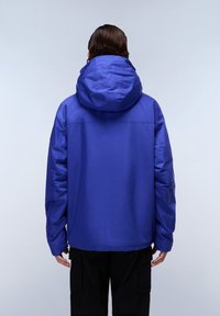 Blue padded jacket with a hood, featuring a smooth texture and elastic cuffs. Includes a small pocket on the left sleeve.